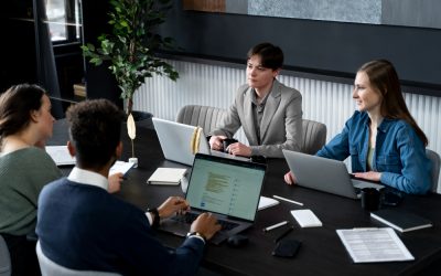 trans-person-working-office-with-colleagues